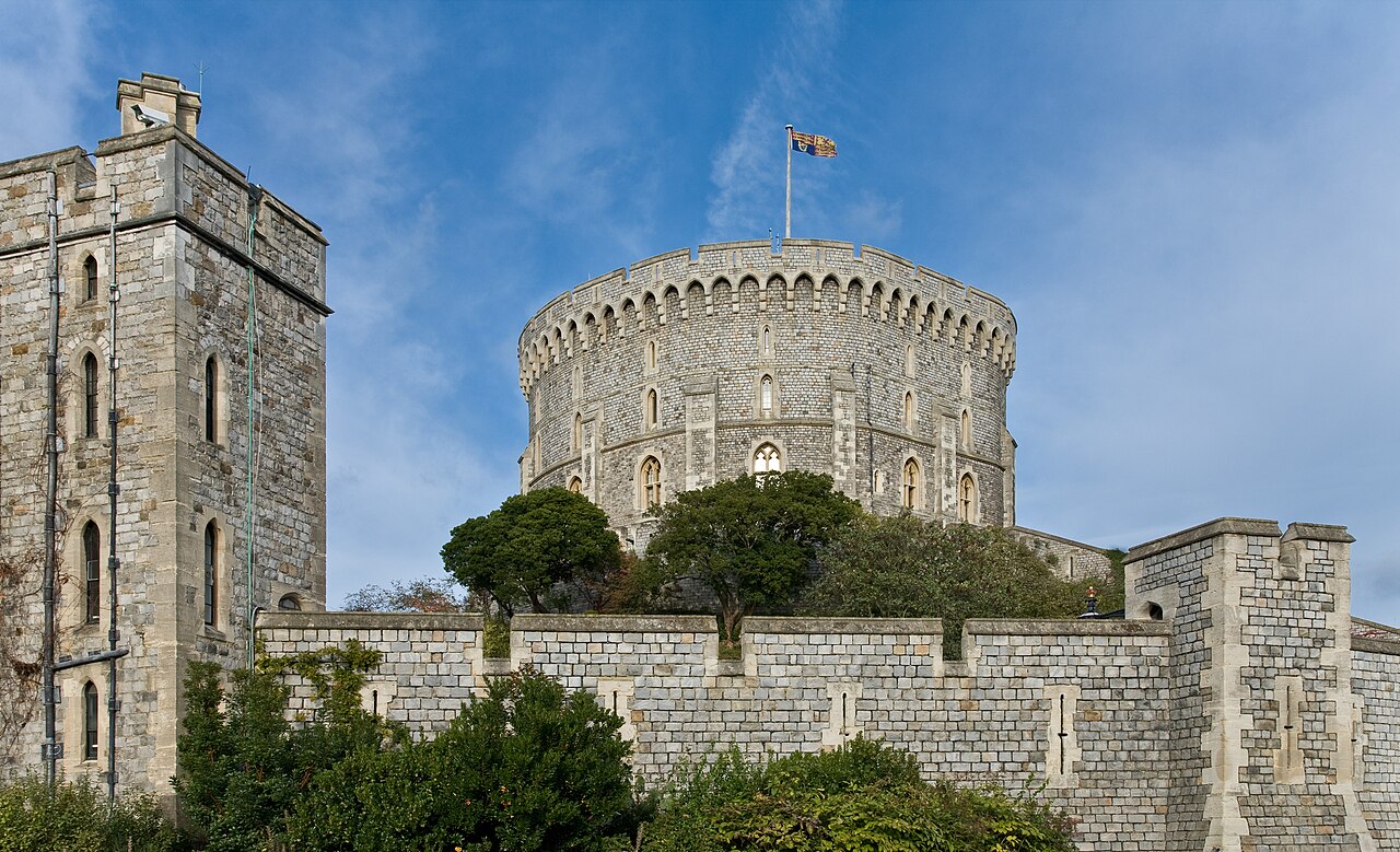 The Round Tower of Windsor Castle above the walls, seen on a winter day.